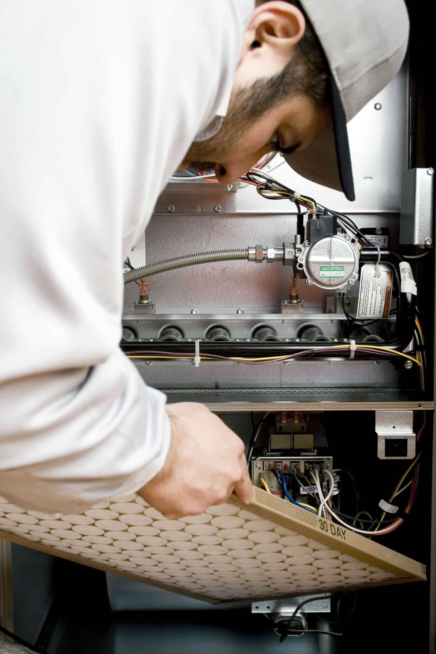 technician servicing hvac